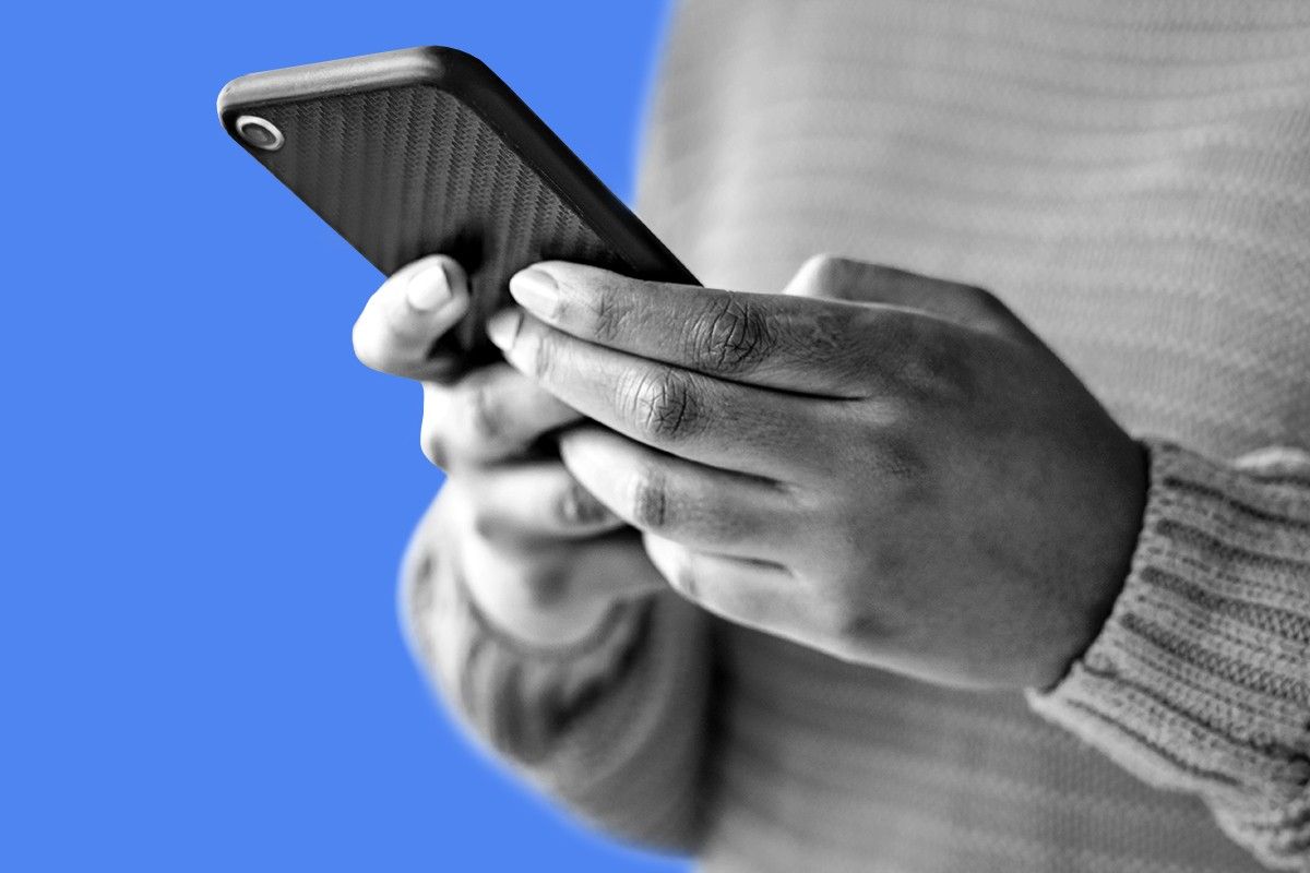 A person checking a phone.