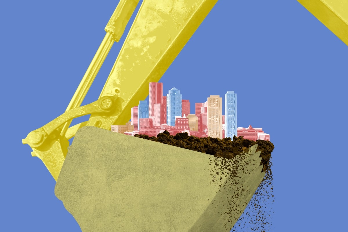 Boston being dug by a backhoe.