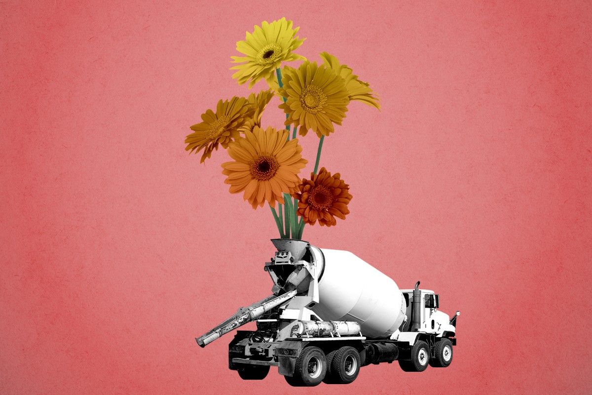 A cement mixer with flowers.