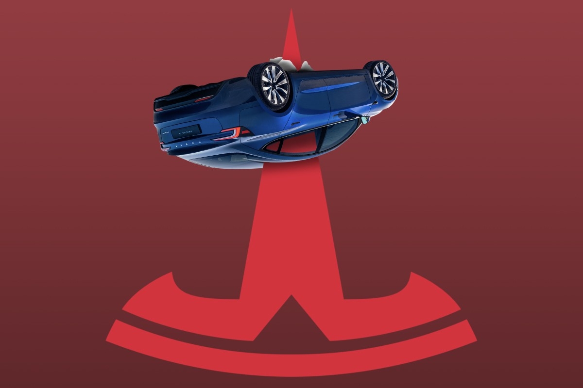 A Tesla impaled by the Tesla logo.