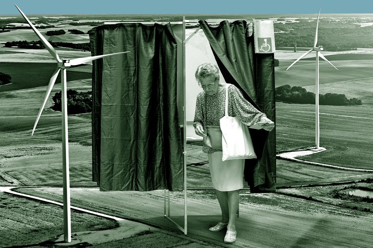 A voter and wind turbines.