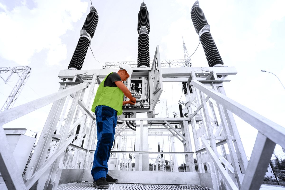 A worker and power lines.