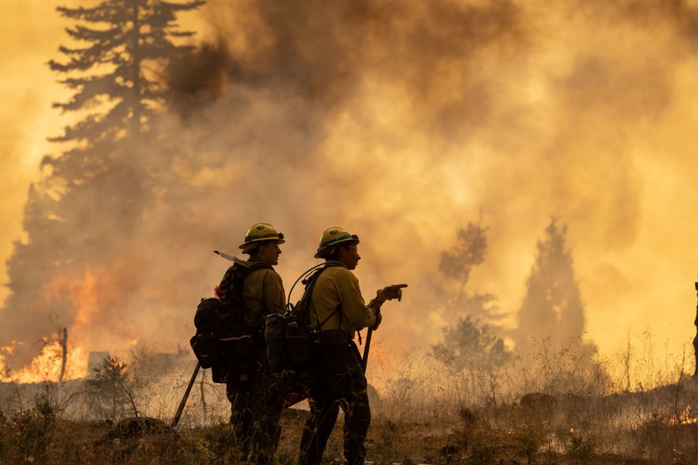 Firefighters work to contain the Park Fire\u2019s eastern front in Chico, California.