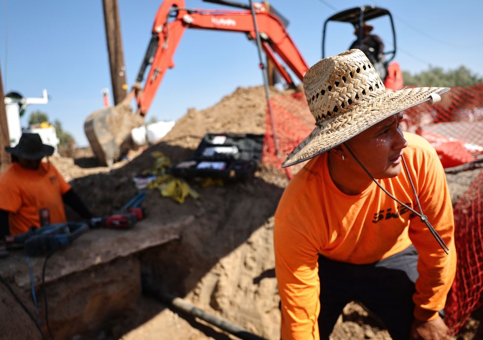Workers endure triple-digit heat in California.