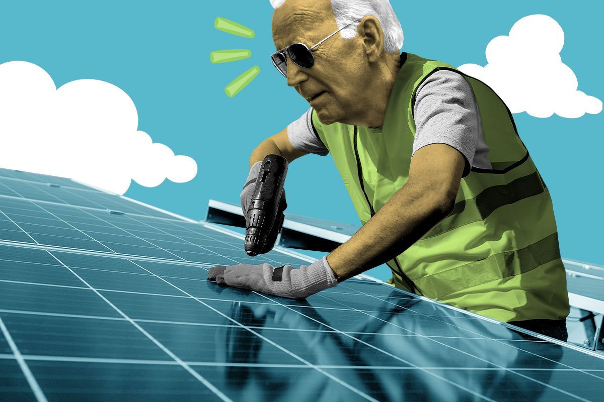 President Biden installing solar panels.