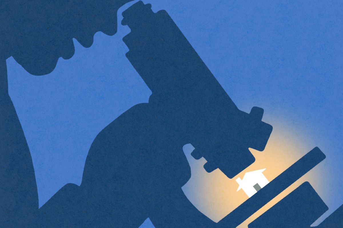 A scientist looking at a house with a microscope.