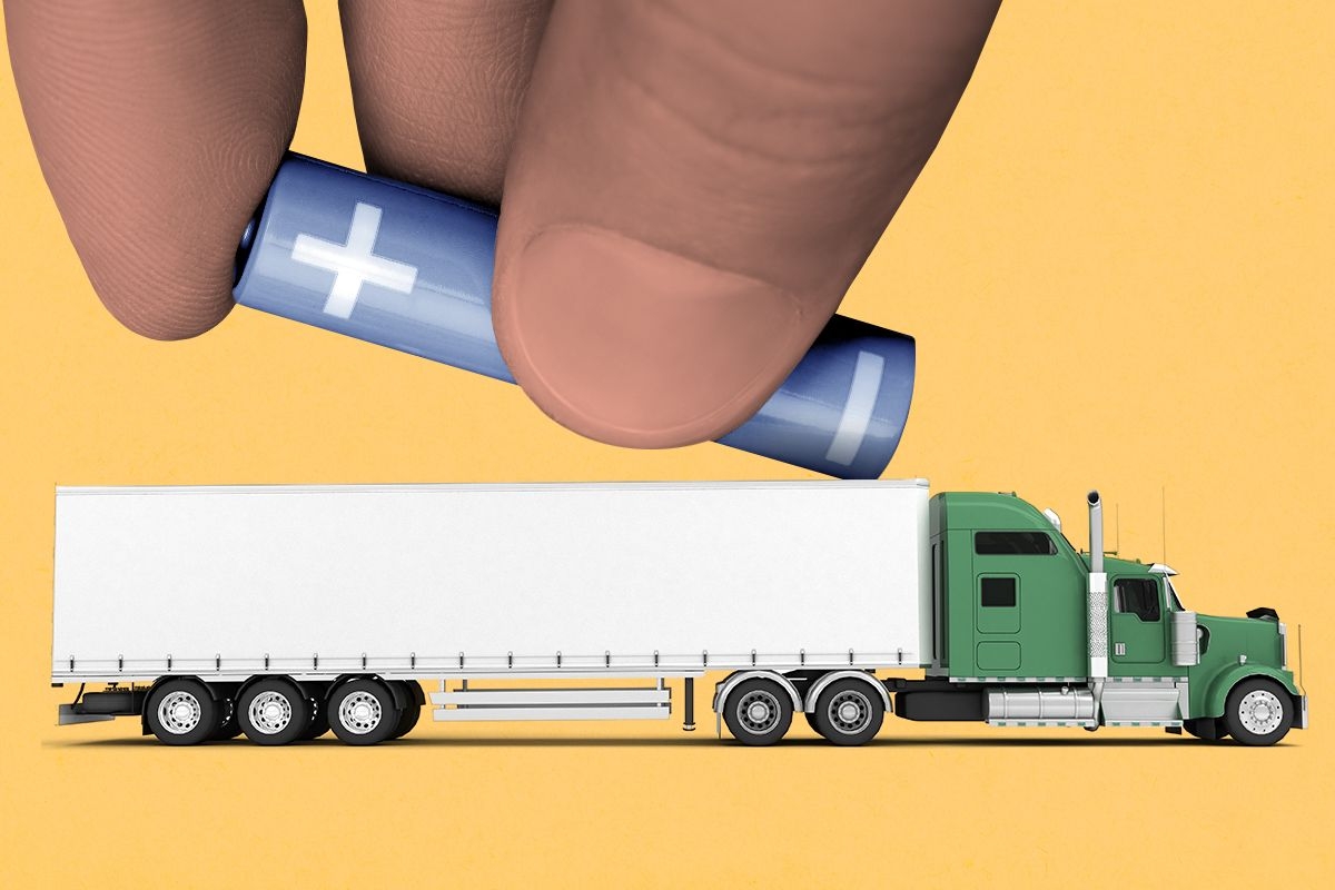 Putting a battery into a truck.