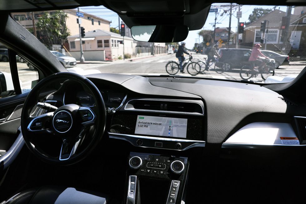 A self-driving Waymo on the streets of Los Angeles.