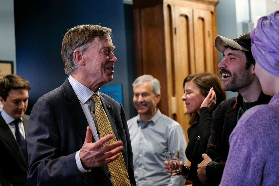 John Hickenlooper and event guests.