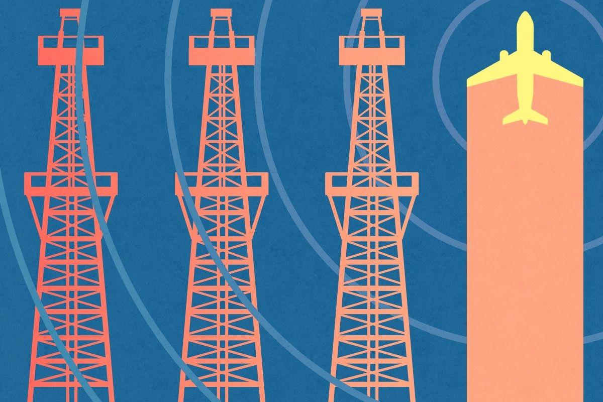 A plane and oil towers.