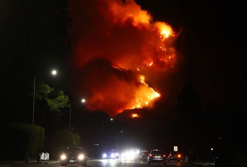 Roughly 50 miles to the northeast, the Eaton Fire burns in Sierra Madre.