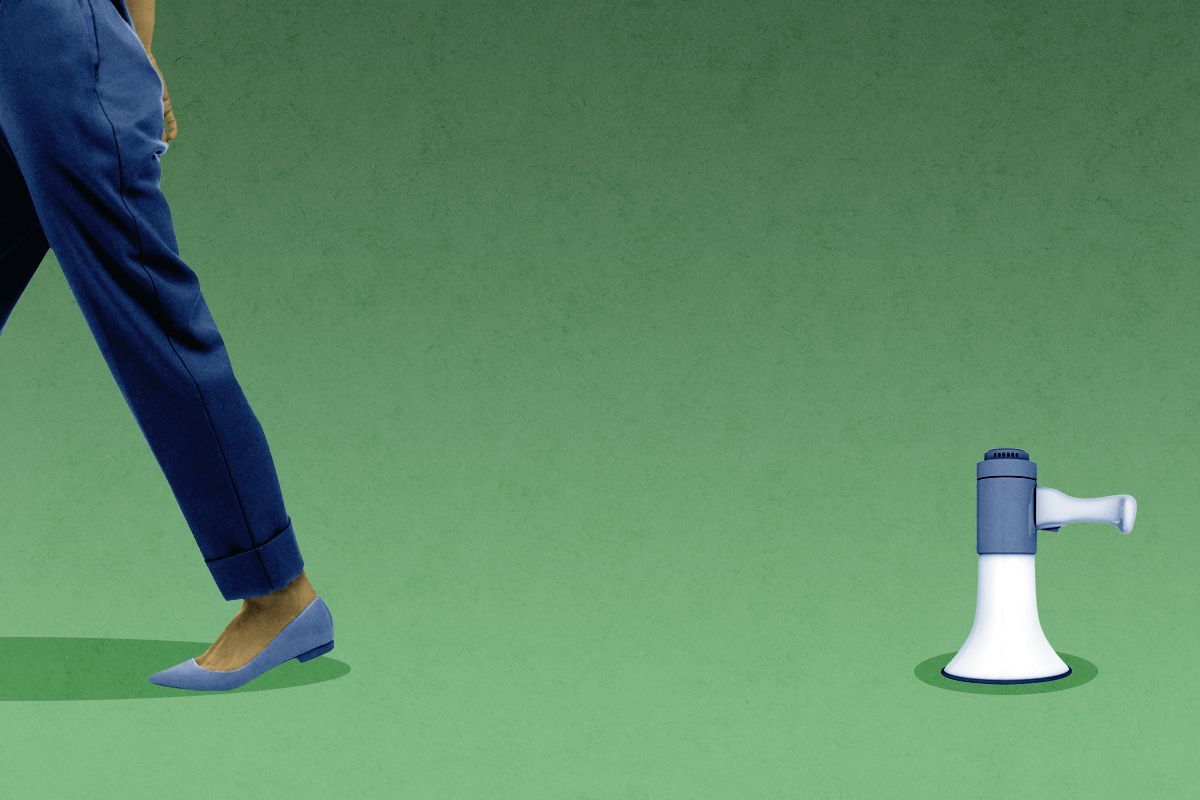 Walking away from a megaphone.