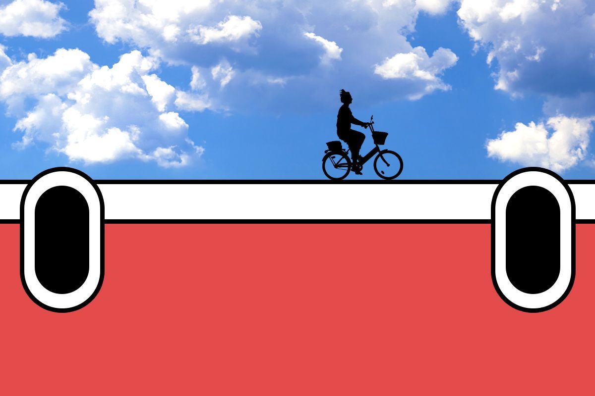 A bike rider on Rivian headlights.