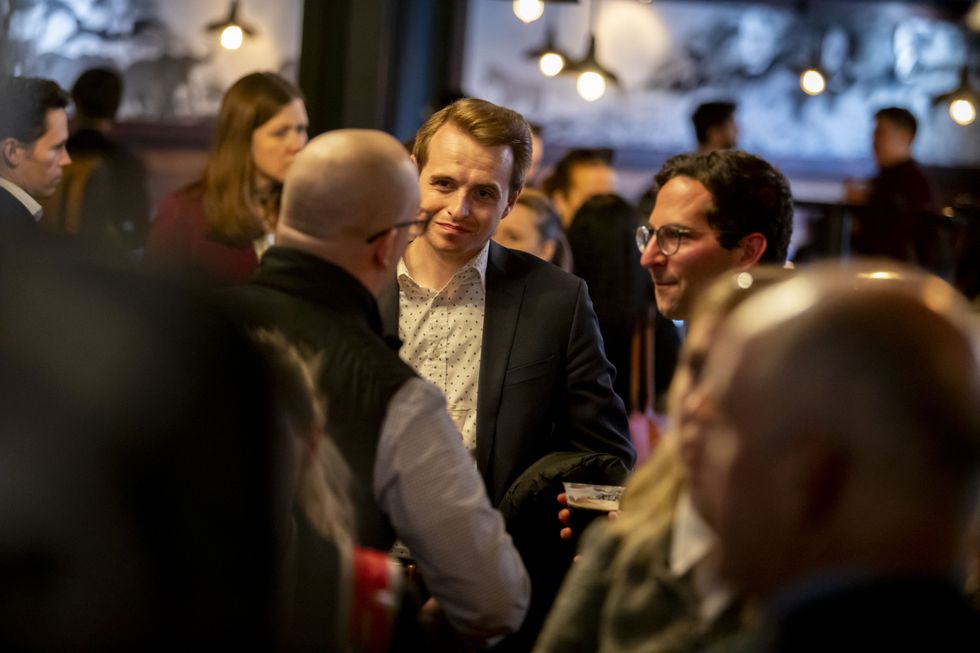 Guests following the discussion.