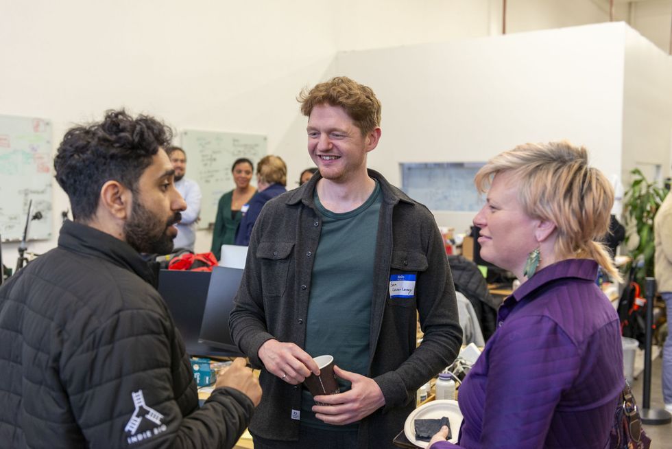 Guests following the discussion.