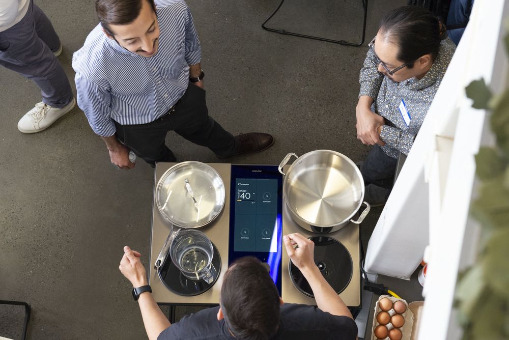 Impulse's high-power Cooktop on display at the event.