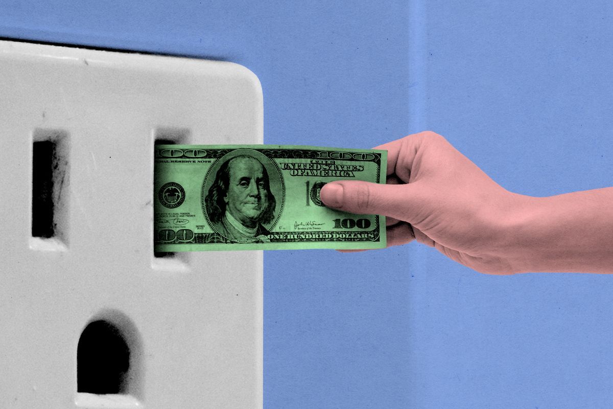 Inserting money into a socket.