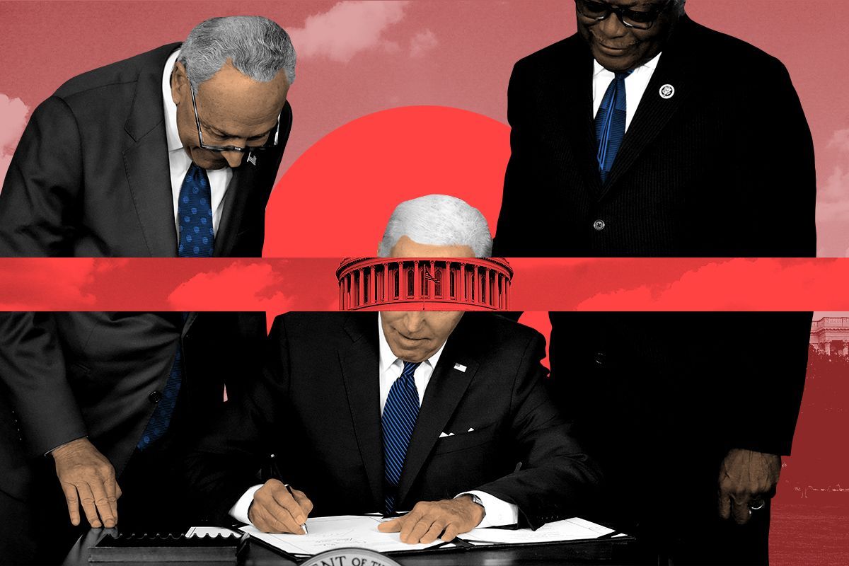 Biden signing the IRA.