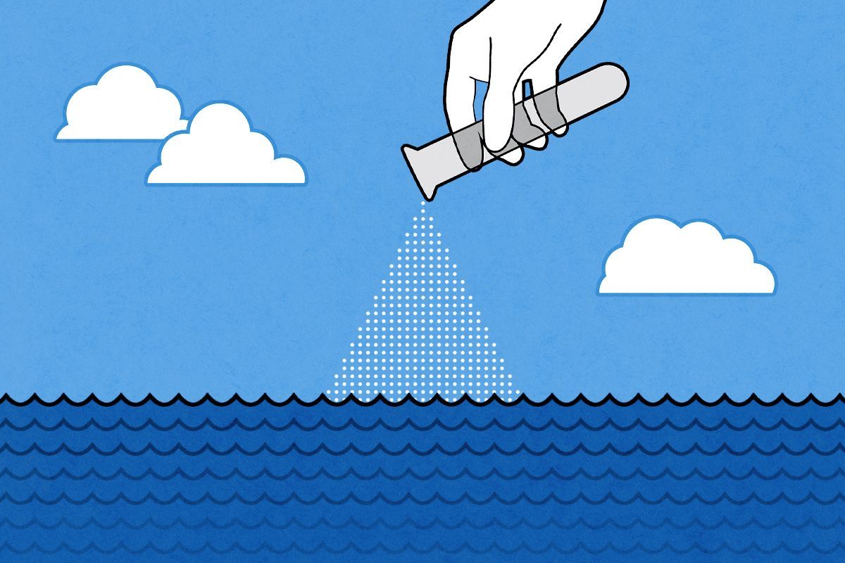 Pouring a substance into water.