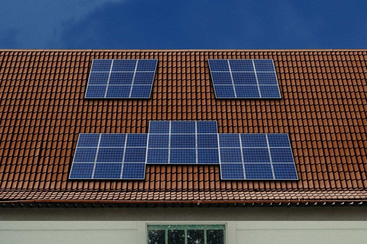 Sad solar panels on a roof.