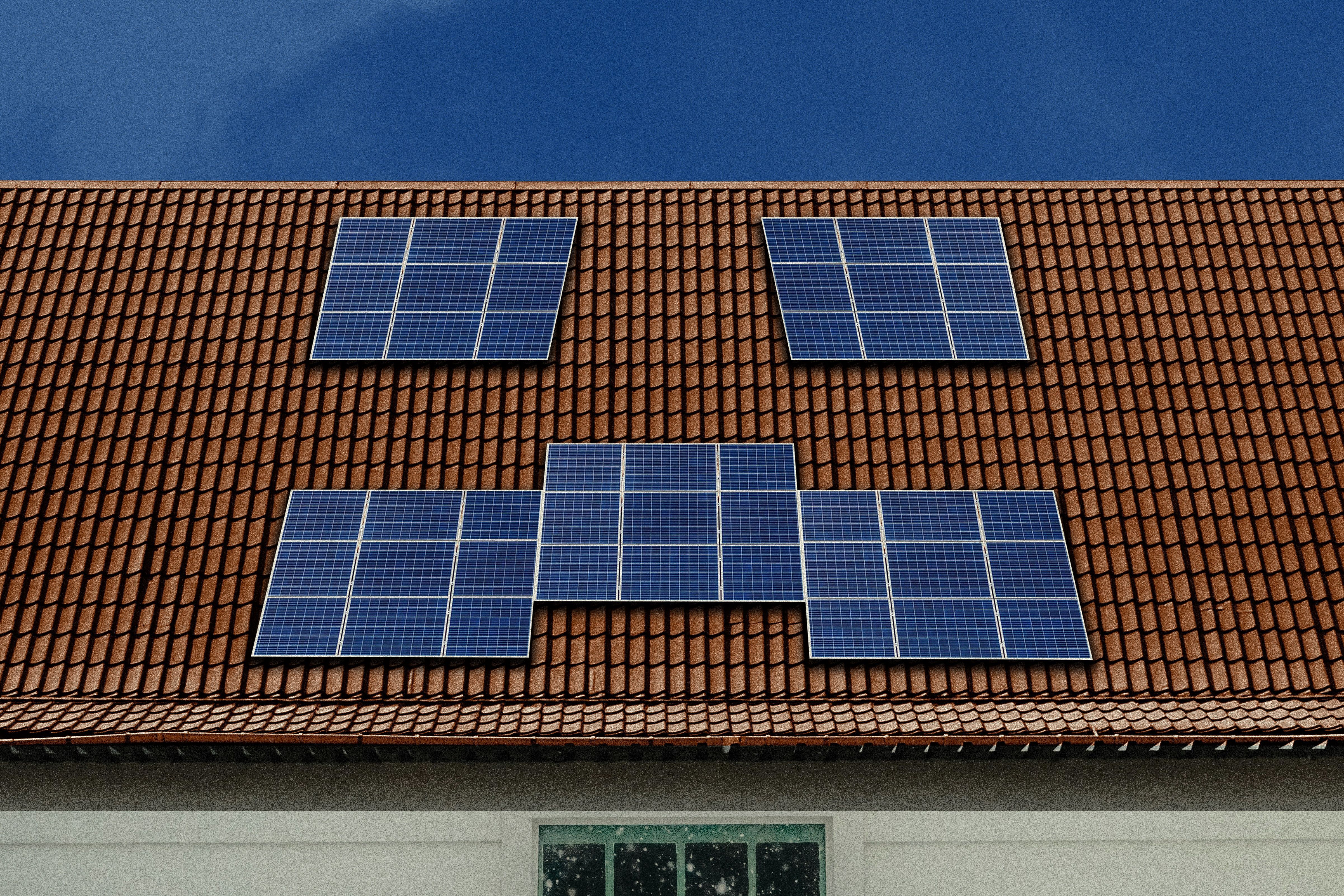 Sad solar panels on a roof.