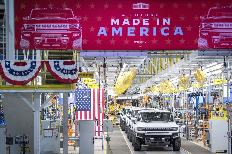 Electric Hummers come off the line at a Michigan plant in 2021.
