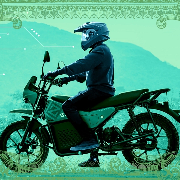 A man on a motorcycle.