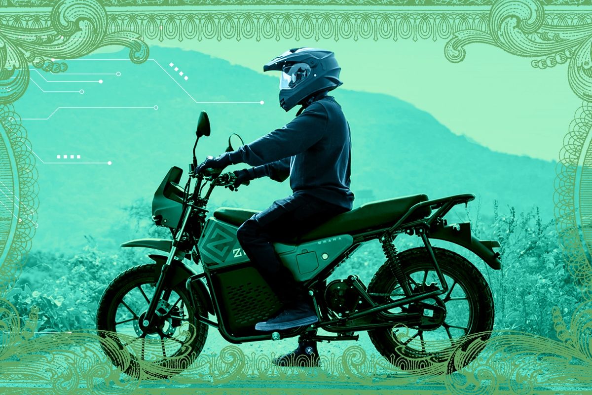 A man on a motorcycle.