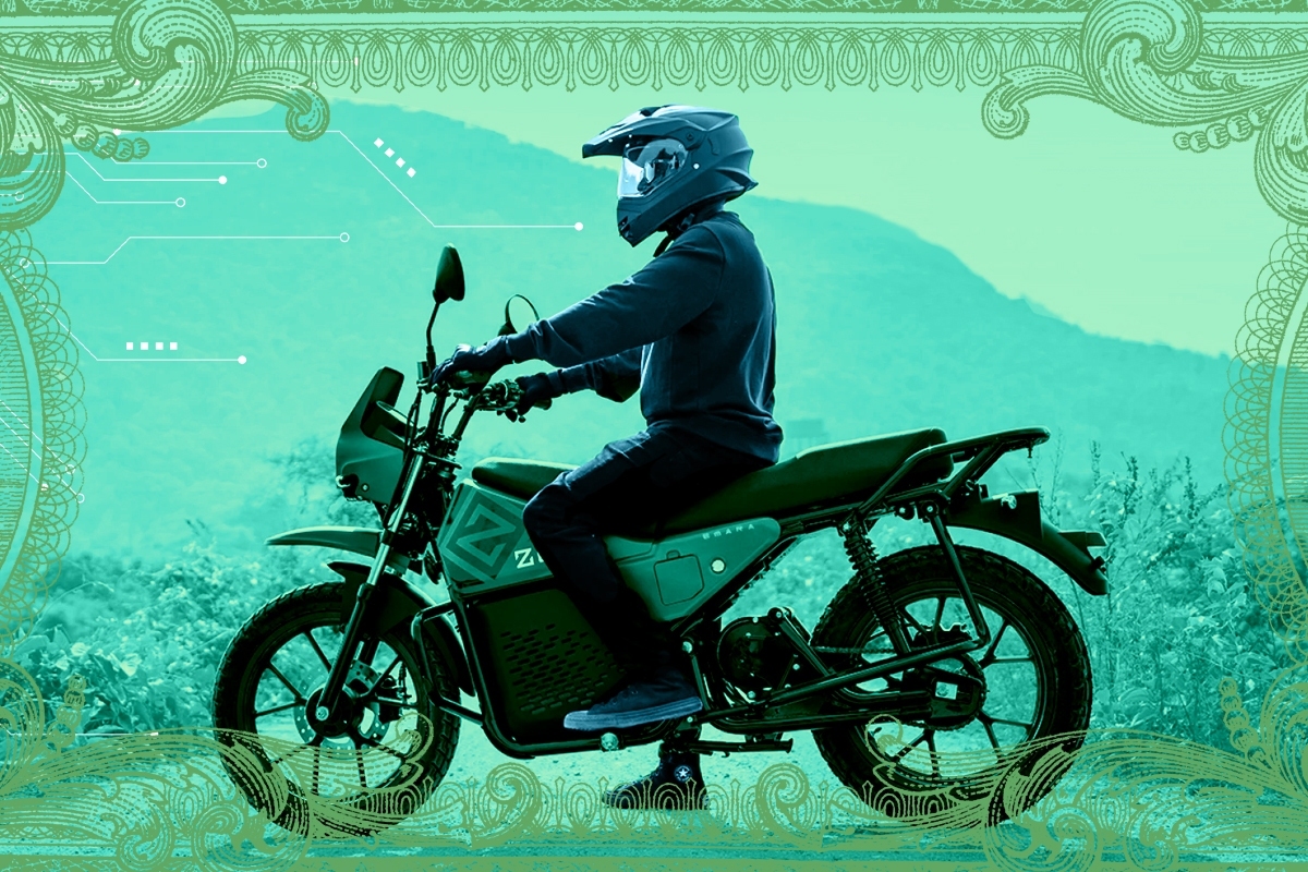 A man on a motorcycle.
