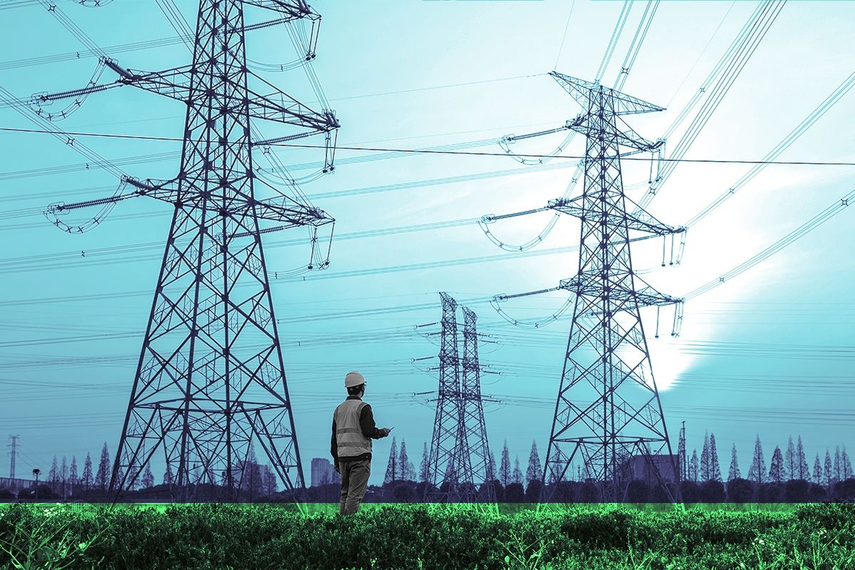 An electricity worker and power lines.