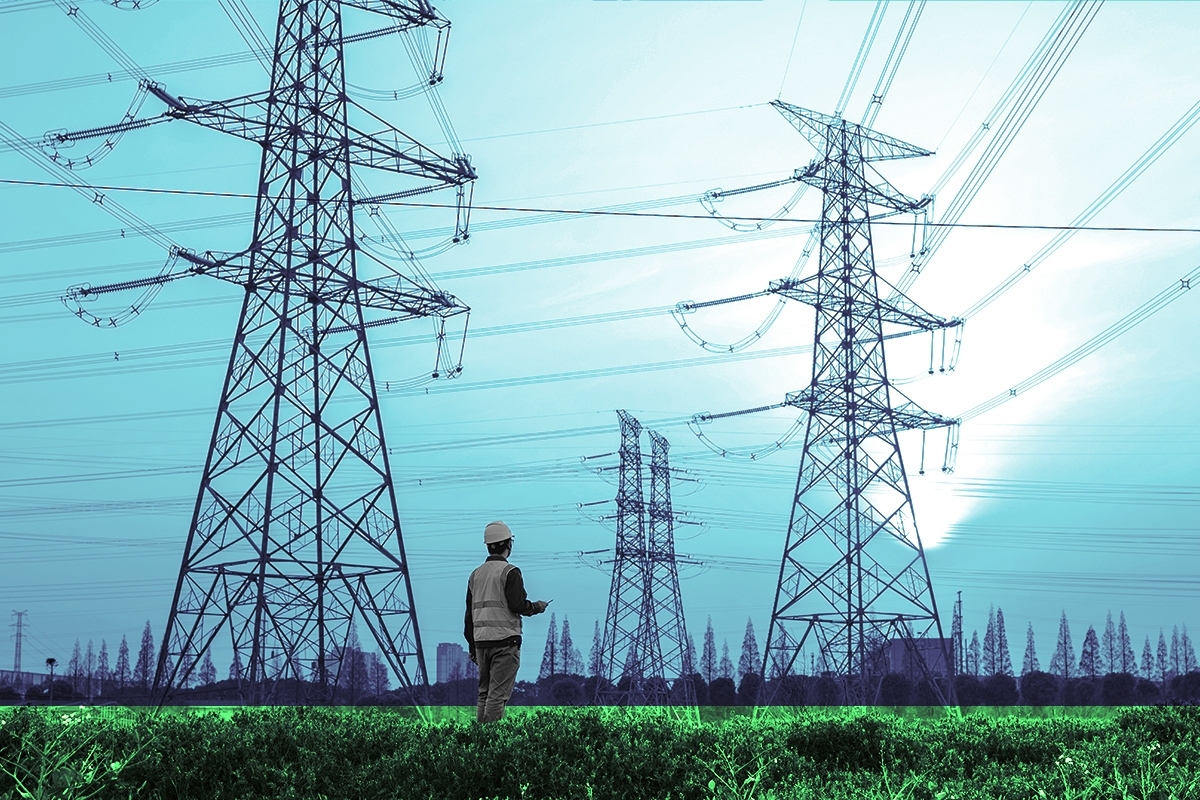 An electricity worker and power lines.