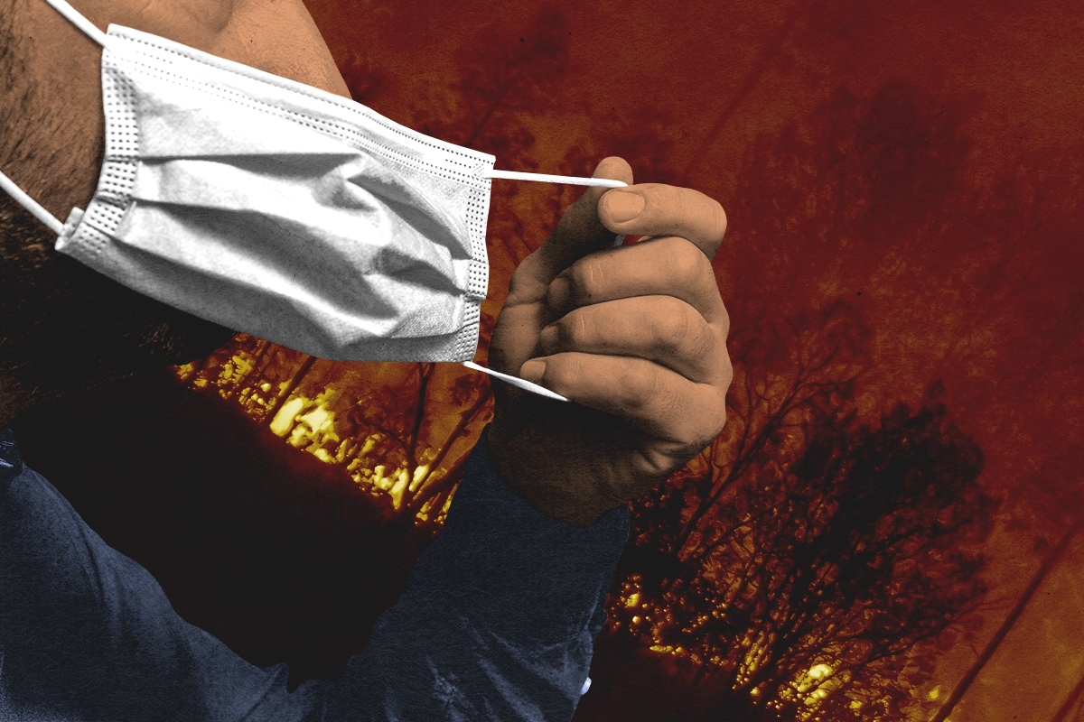 Taking off a mask during a wildfire.