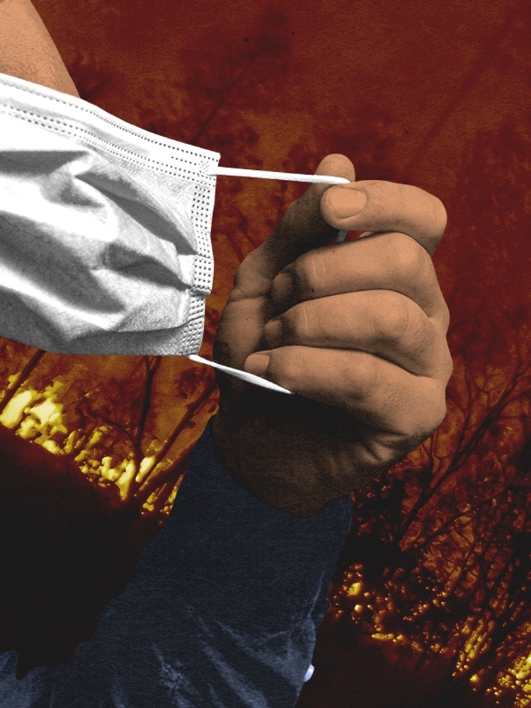 Taking off a mask during a wildfire.