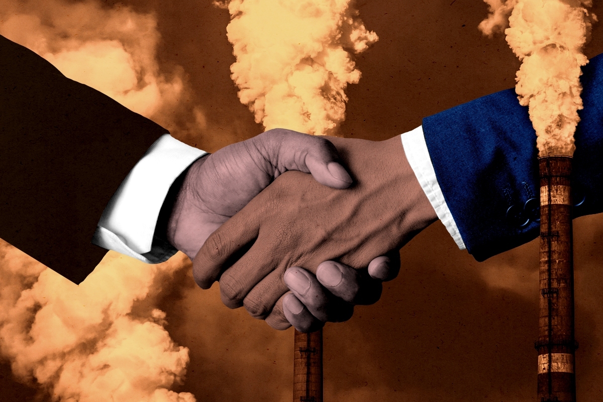 A handshake amidst smokestacks.
