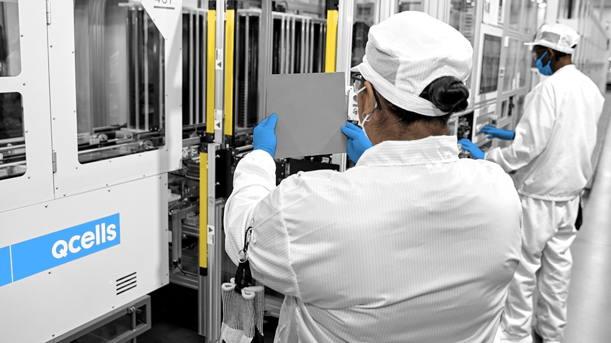 Qcells workers.