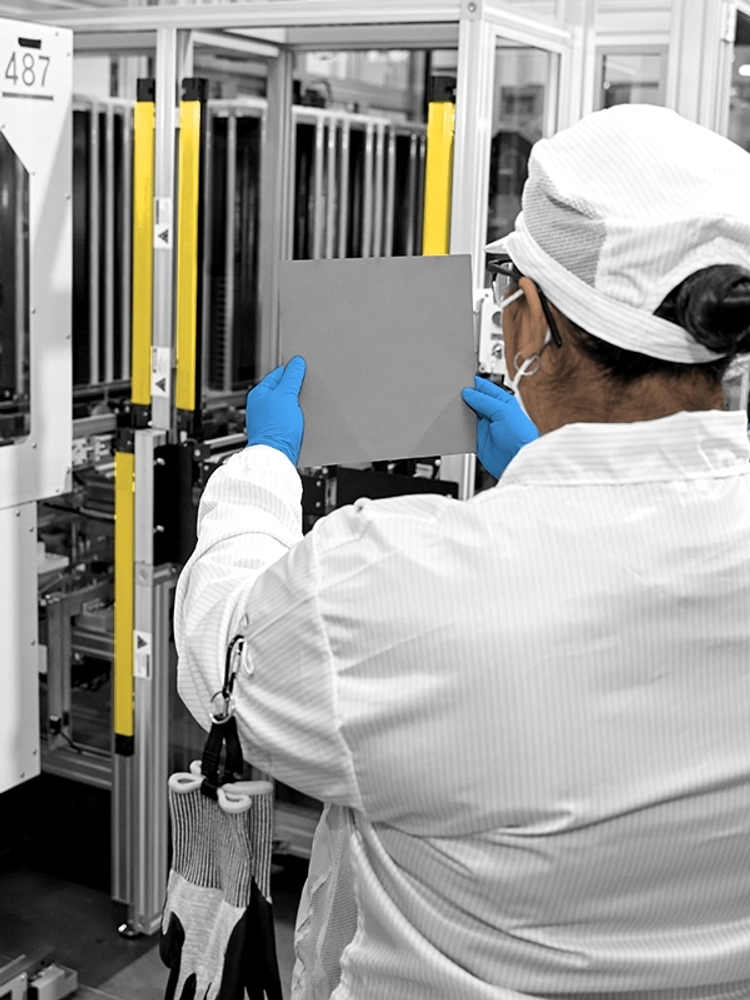 Qcells workers.