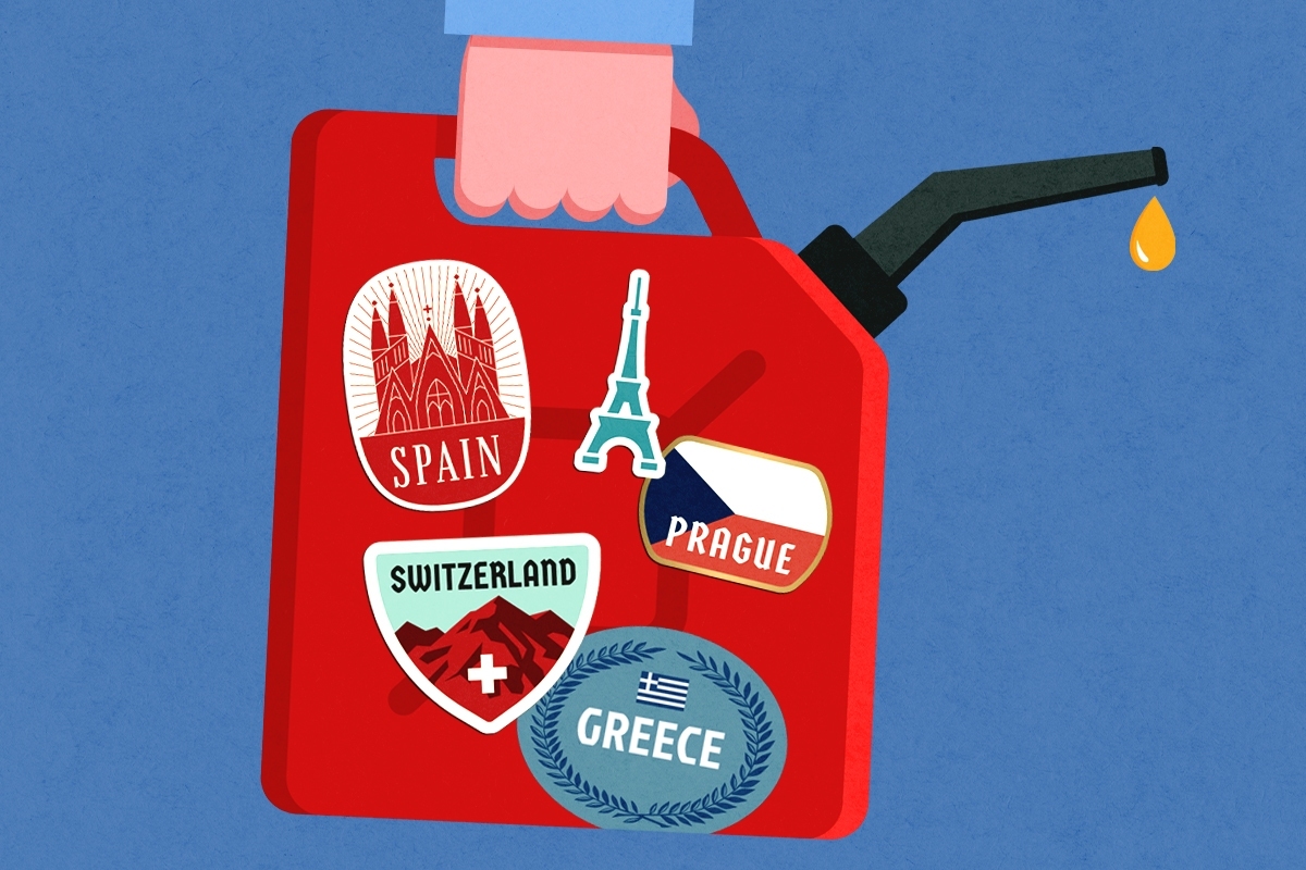 A gas can with stickers on it.