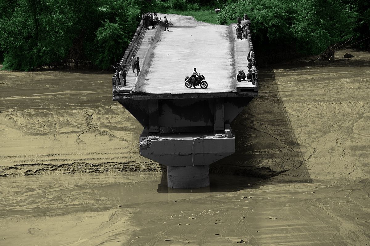 A destroyed bridge in Nepal.