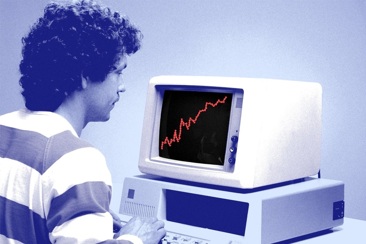 A man looking at a chart