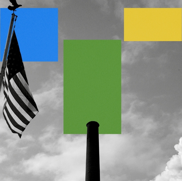 Smokestacks and an American flag.