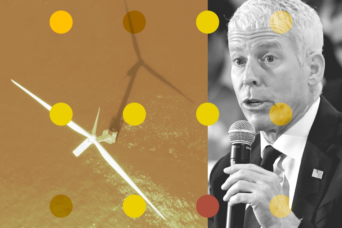 A wind turbine and Chris Wright.