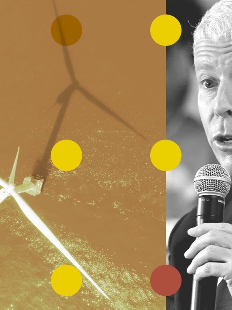 A wind turbine and Chris Wright.