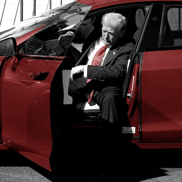 Trump getting out of a Tesla.