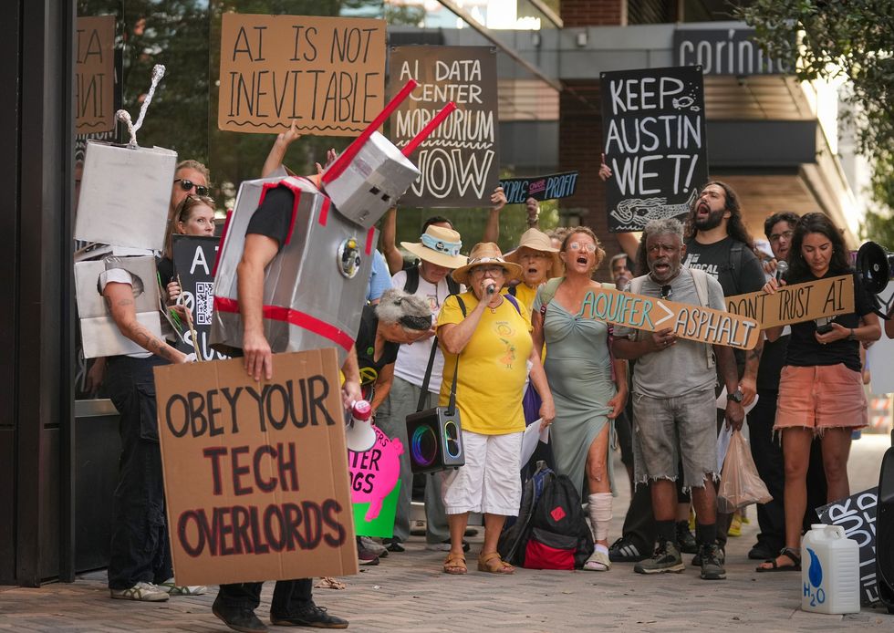 A protest against data center development outside the Austin Marriott in Texas in early September.
