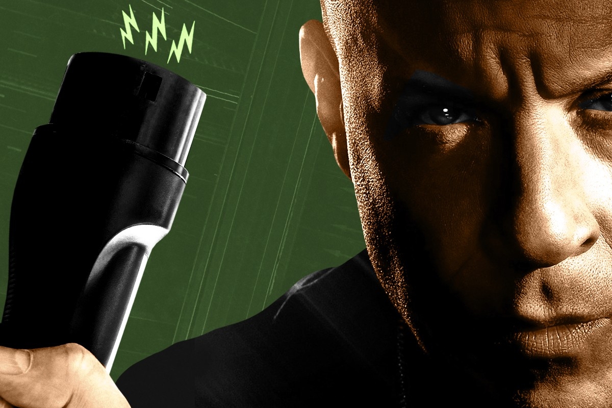 Vin Diesel holding a charger.