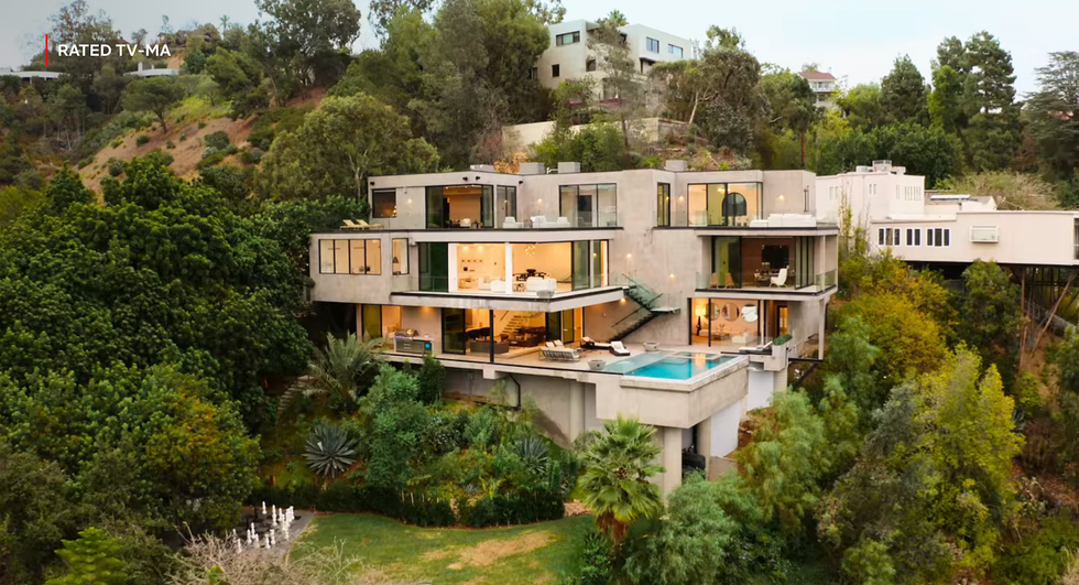 Modern concrete mansion built into a hill with a pool in Beverly Hills