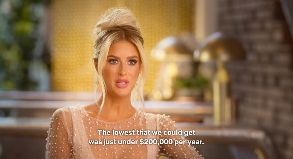 Real estate agent Emma Hernan explains to the audience that the lowest fire insurance they could find was $200,000 per year.