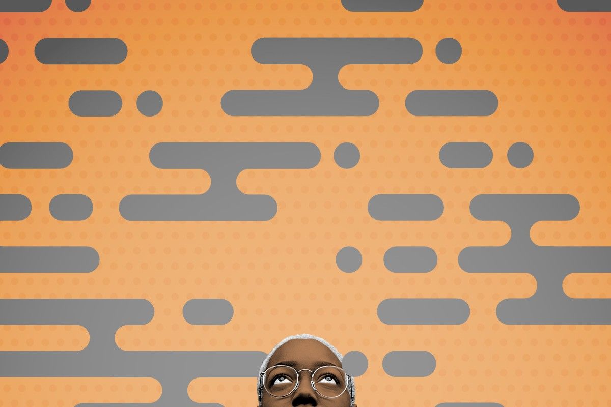 A woman looking at smoke.