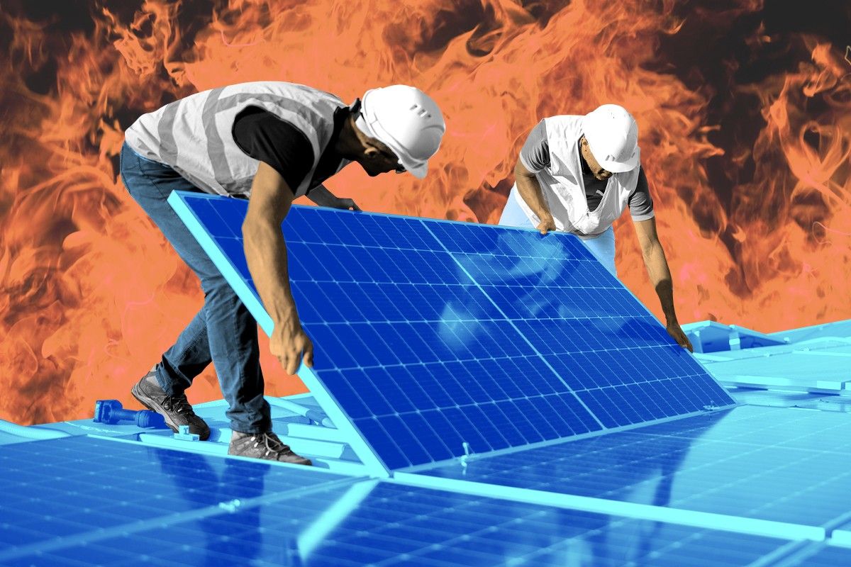 Workers installing solar panels.