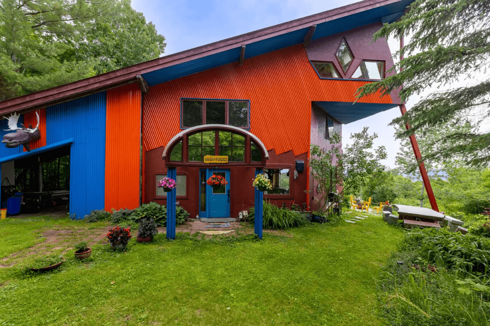 Red and blue Vermont house described as "a Giant Dr. Seuss Playhouse of Fun"